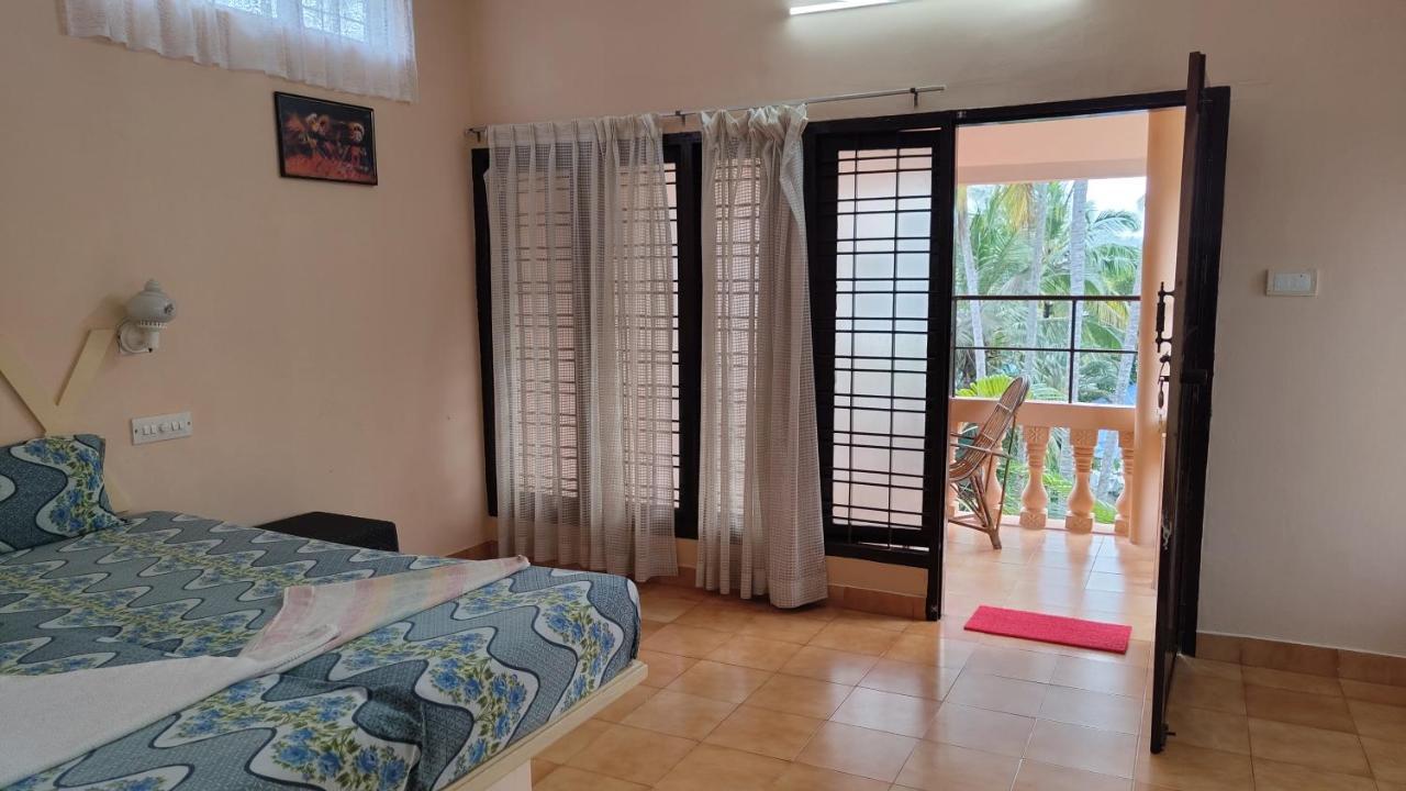 Hotel Greenland Thiruvananthapuram Стая снимка